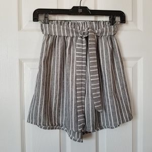 Grey and white wide leg shorts with the belt